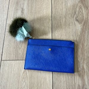 Women’s J.Crew royal blue zippered clutch bag, with removable Pom accessory